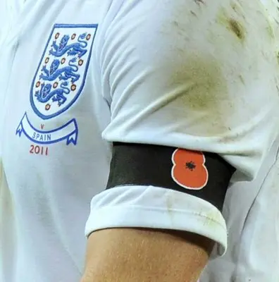 Image result for WEARING POPPIES during match on Armistice Day