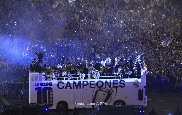 بالصور.. الألاف يحتفلون مع "بطل أوروبا" في ساحة سيبيليس بمدريد  ?i=epa%2fsoccer%2f2014-05%2f2014-05-25%2f2014-05-25-04223701_epa