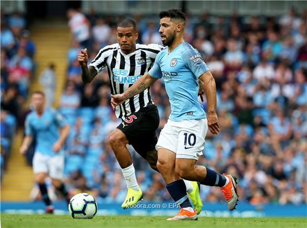 Manchester City's Sergio Aguero (R) in action against Newcastle United's Kenedy (L) during the English Premier League soccer match between Manchester City and Newcastle United in Manchester, Britain, 01 September 2018.