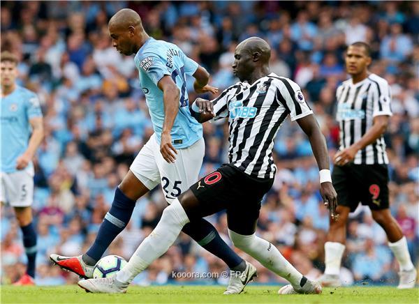 Manchester City's Fernandinho (L) in action against Newcastle United's Mohamed Diame (C) during the English Premier League soccer match between Manchester City and Newcastle United in Manchester, Britain, 01 September 2018.
