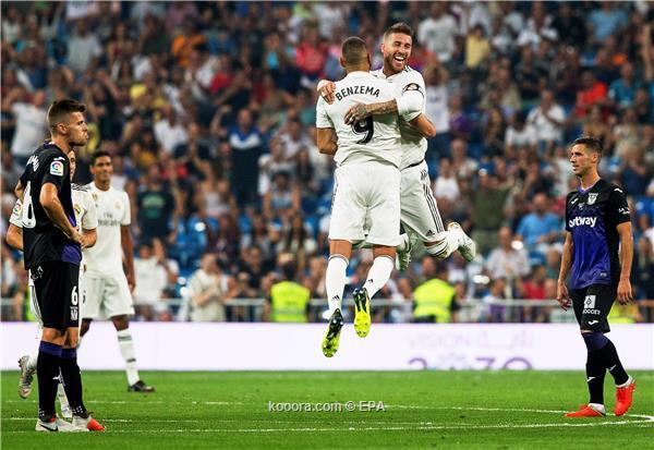 Real Madrid's Karim Benzema (C-L) celebrates with his teammate Sergio Ramos (C-R) after scoring a goal during the Spanish La Liga soccer match between Real Madrid and CD Leganes in Madrid, Spain, 01 September 2018.