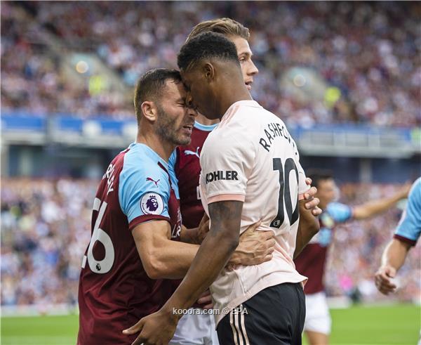Manchester United's Marcus Rashford (R) clashes with Burnley's Phillip Bardsley (L) during the English Premier League soccer match between Burnley FC and Manchester United in Burnley, Britain, 02 September 2018.