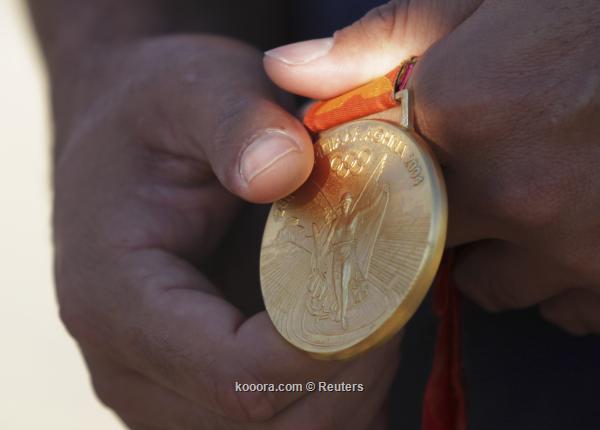 ميداليات أوليمبياد لندن تزن 8 اطنان من الذهب والفضة والبرونز! ?i=reuters%2f2012-07-06%2f2012-07-06t033128z_410666439_gm1e8760vyn01_rtrmadp_3_oly-voll-br_reuters