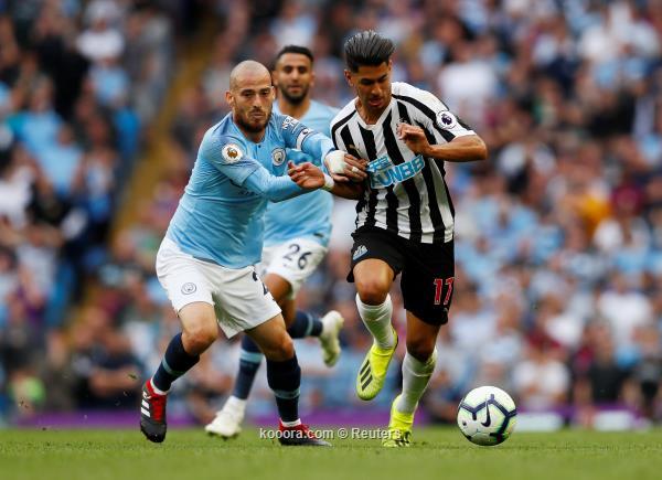 Soccer Football - Premier League - Manchester City v Newcastle United - Etihad Stadium, Manchester, Britain - September 1, 2018  Newcastle United's Ayoze Perez in action with Manchester City's David Silva      Action Images via Reuters/Jason Cairnduff  EDITORIAL USE ONLY. No use with unauthorized audio, video, data, fixture lists, club/league logos or live services. Online in-match use limited to 75 images, no video emulation. No use in betting, games or single club/league/player publications.  Please contact your account representative for further details.